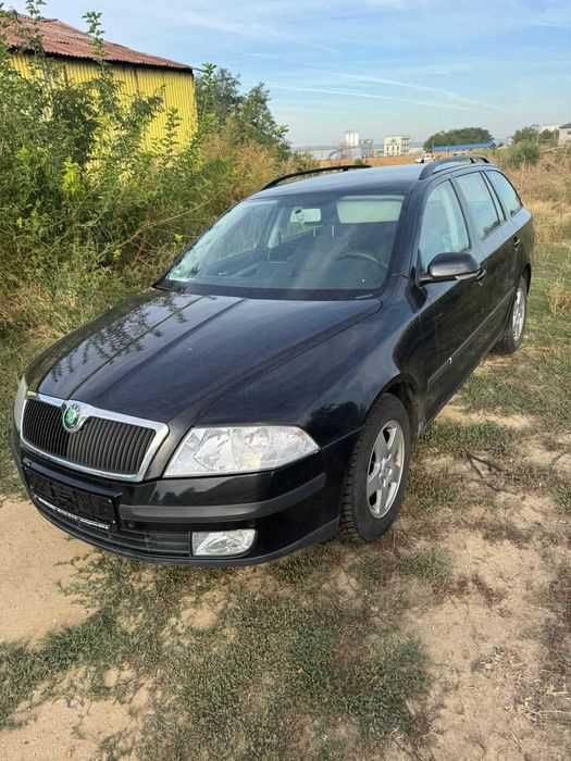 Piese Skoda Octavia 2 non facelift - negru - Bara fata , capota motor , trager , motor 1.9 TDI 105cp cod BKC , aripi usi manuala 5 trepte cutie JCR