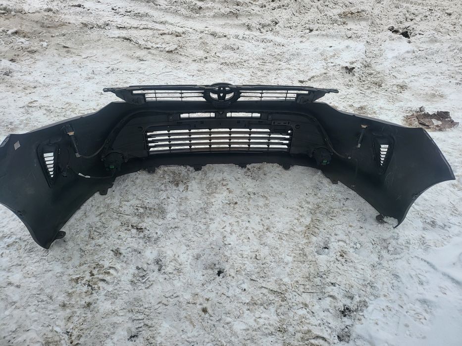 Передний бампер Тойота Камри 55