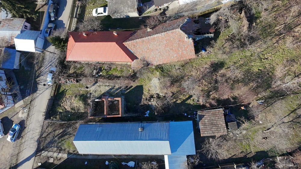 Vând proprietate în Comana: teren 1.974 mp, cu 21 m deschidere la stradă