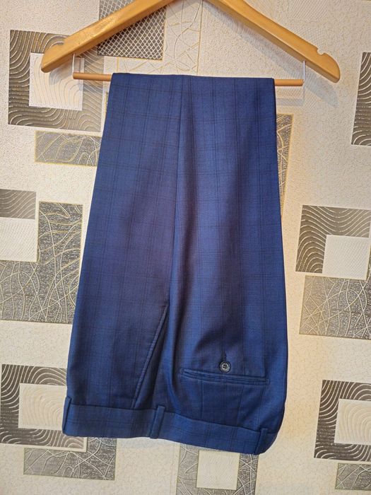 Продам костюм пиджак брюки 48 размер