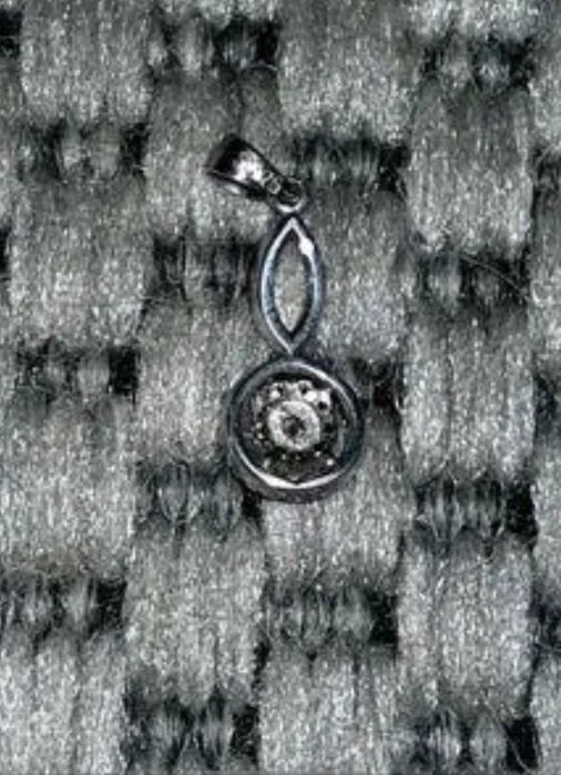 Продам кулон с серебряным кольцом