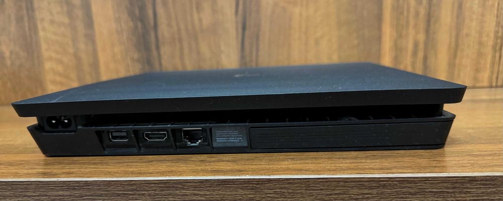 Sony PlayStation 4 Slim 1TB + 2 геймпада + игры