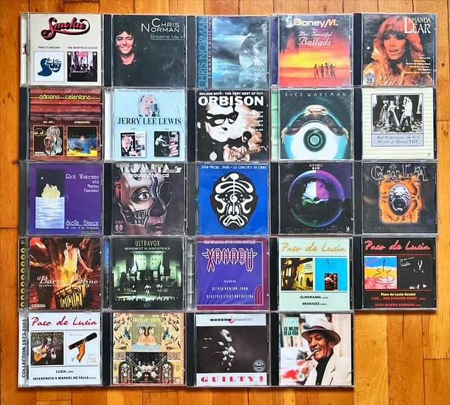 Lot CD rusesti rock&pop: Pink Floyd, Zappa, Jethro Tull, Maiden, Smokie, Wakeman, De Lucia