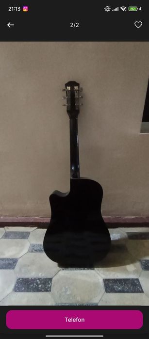 Gitara yangi xali ishlatilmagan