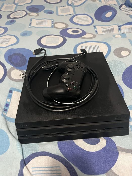 Ps 4 pro plus un joc la alegere