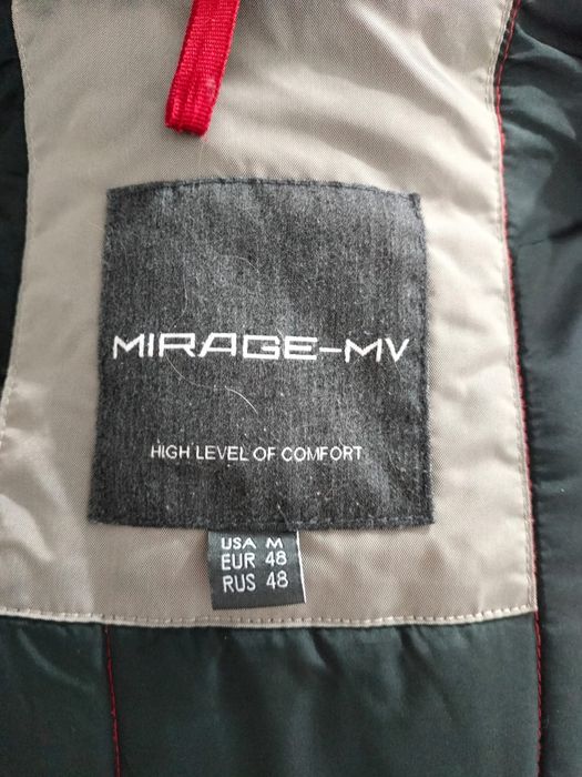 Продам оригинальный пуховик