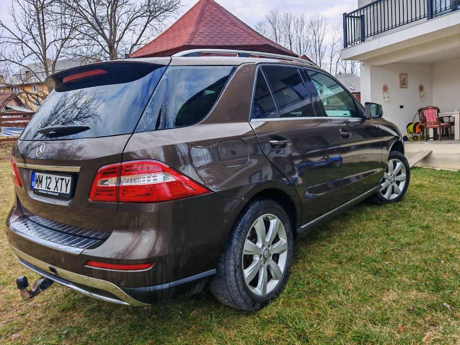 Mercedes ML impecabil .