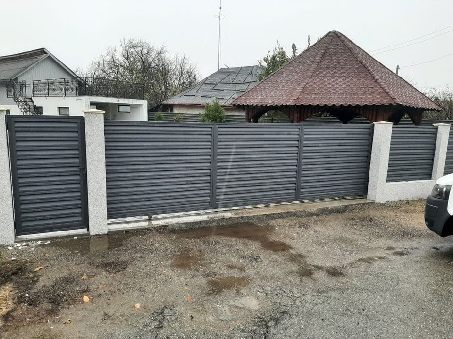 Construim porți la comanda clientului ne deplasăm în toată țara porți din șipcă metalică porți din lamele porți din tablă cutată