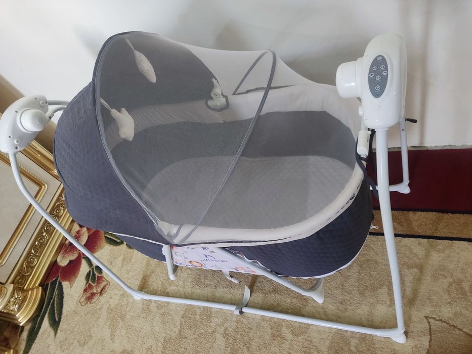 Elektronni bolalar belanchagi (karavat)