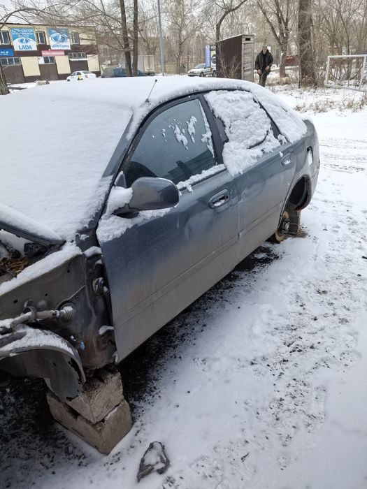 Мазда Кронос, капот, двери.