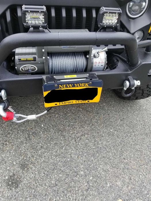 Suport numar de inmatriculare cu prindere pe  troliu