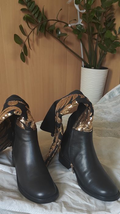 Продам новые сапоги