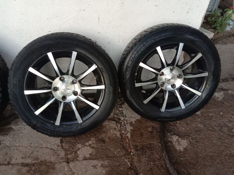 Продам титановые диски р 15 с резиной