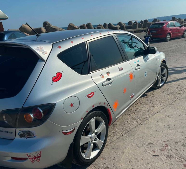 Автомобил Мазда 3