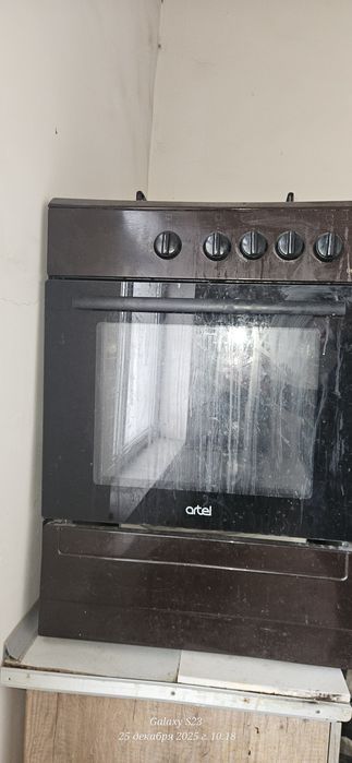 Газовая плита Artel и кухни мебель