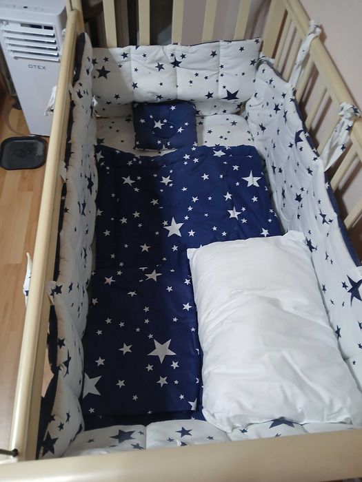 Детская кроватка с бортиками