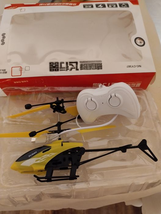 Детская игрушка вертолет