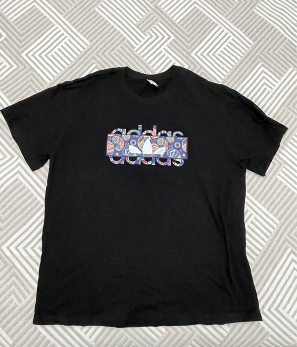 Футболки новые.