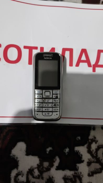 Кнопчний телефон Нокия 62 33