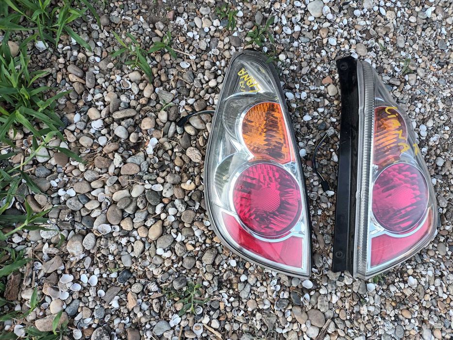 ляв и десен бял стоп за сузуки лиана SUZUKI LIANA