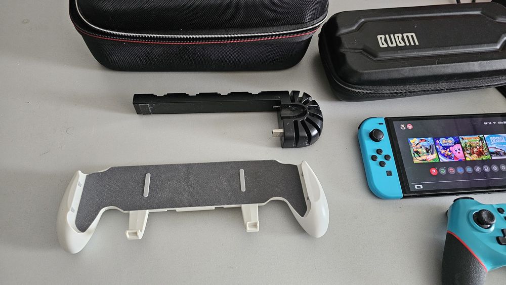 Vand Nintendo Switch OLED + 45 jocuri