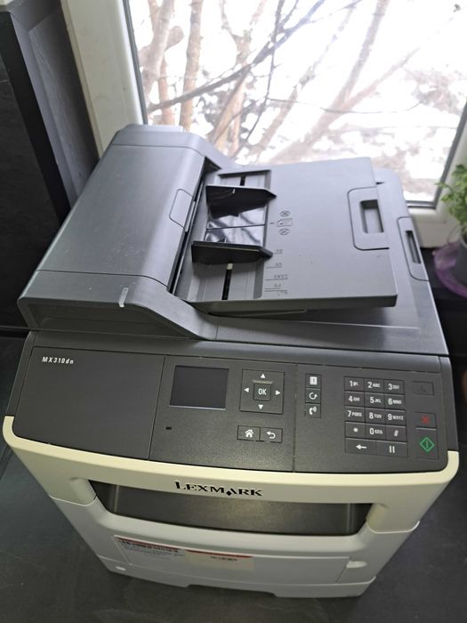 Продавам лазерен мултифункционален принтер Lexmark MX310dn