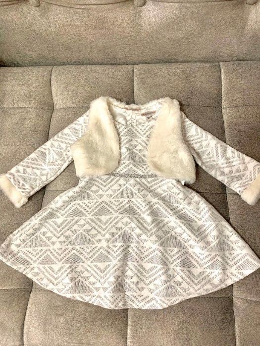 Продам новое детское платье с меховой жилеткой.