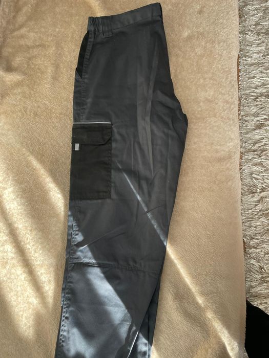 Pantaloni salopetă cu inserții  reflectorizante,noi