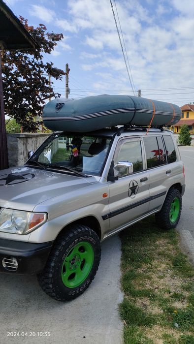 Mitsubishi Pajero Pinin 2.0 blocant central (~Vitara la preț de Jimmy)