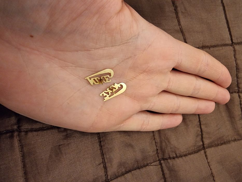 Cercei Nike aur 14 k cu șurub