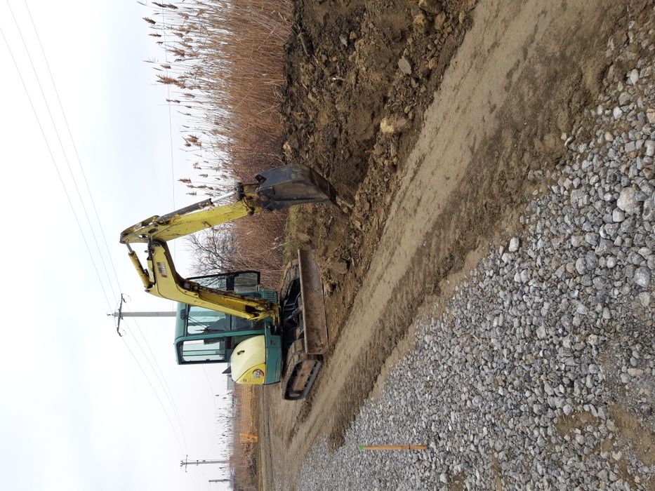Buldoexcavator Demolari Sapatura santuri fundatie Cablu electric gropi