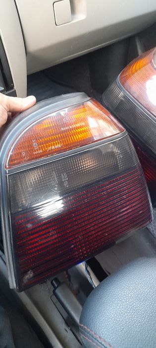 Set stopuri Hella fumuri VW golf 3 GTI complecte  cu socluri .