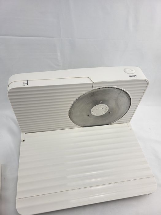 Сгъваема колбасорезачка