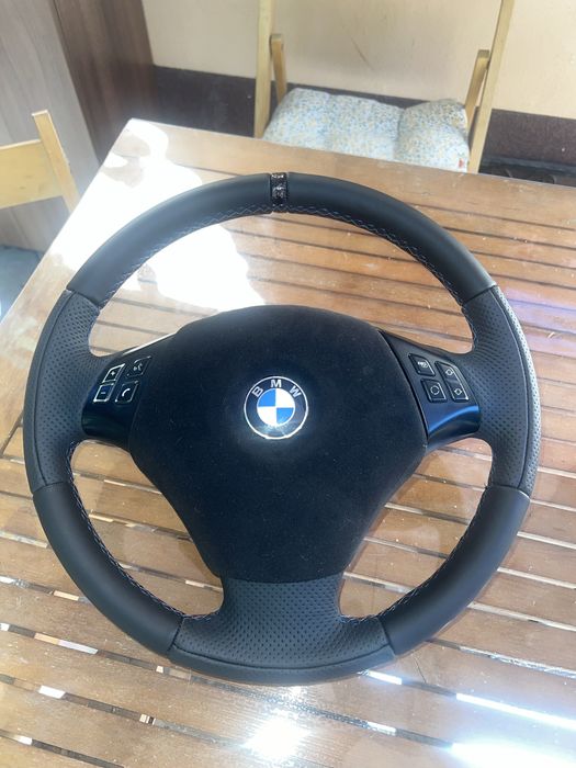 Volan bmw e90  retapitsat
