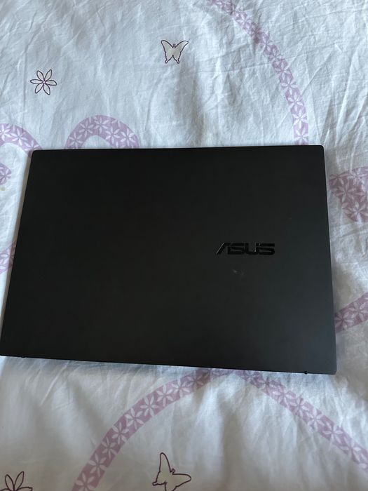 ASUS
 Zenbook 14 14” FHD+ OLED Touch Laptop, Intel Core Ultra 16GB