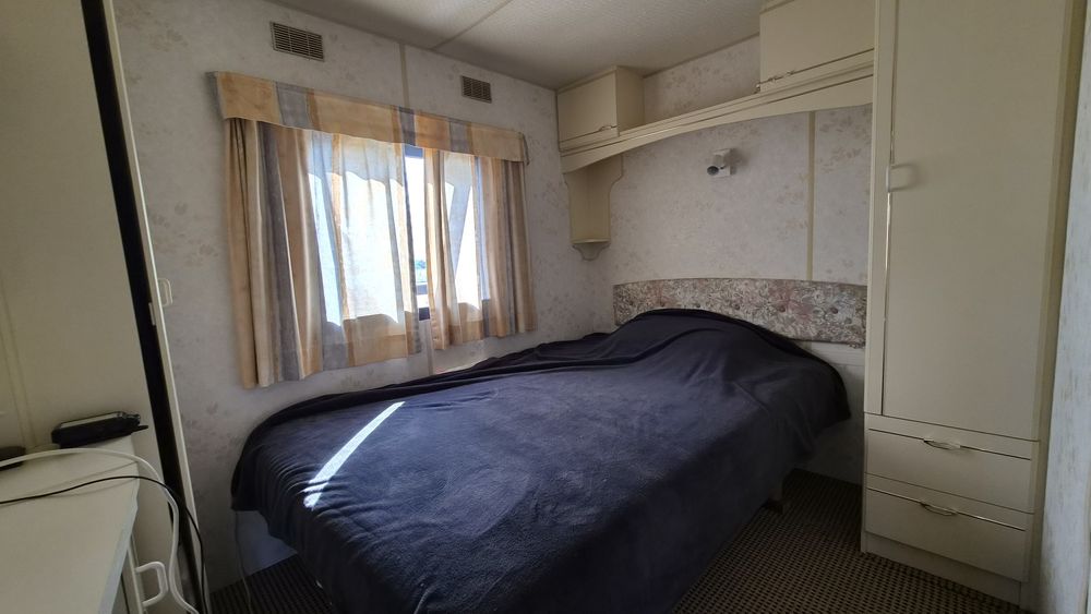 Teren 750 m.  si casa mobila
