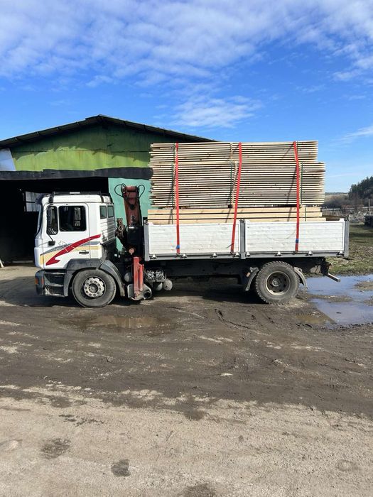 Траснпортни услуги: камион със самосвал с кран