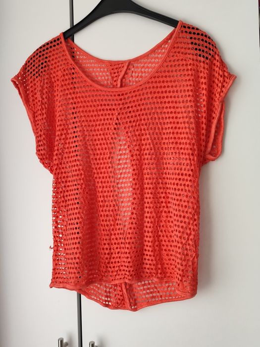 Bluza perforată cu fundițe