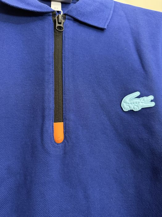Поло lacoste синего цвета