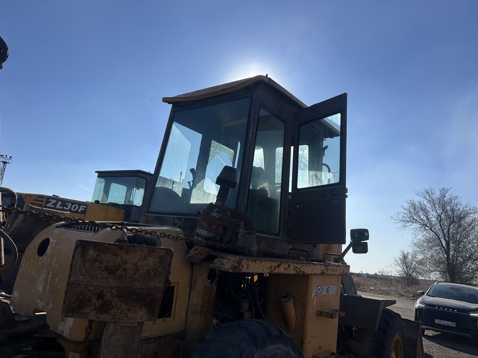 Экскаватор погрузчик китаец