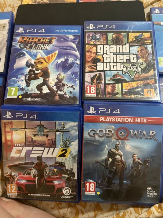 PlayStation 4 Slim 500 GB + 10 jocuri – fără manetă