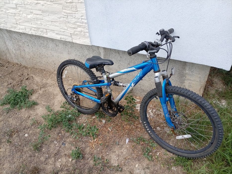 Vand ieftin bicicleta pentru copii roti de 24 , frana pe disc.