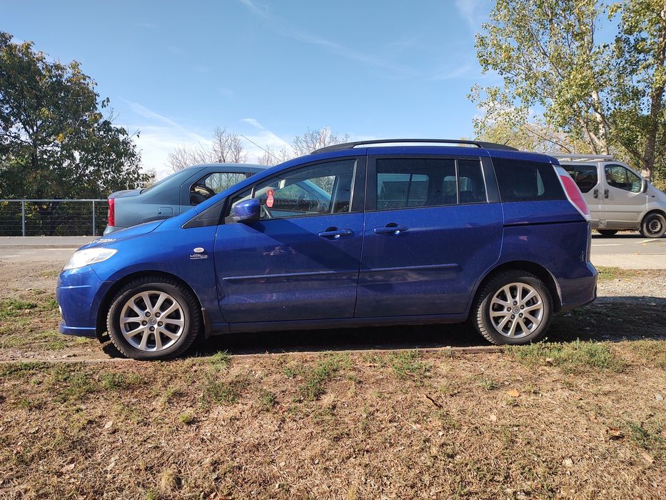 Mazda 5 (2008) • 2.0 Diesel (143 CP) • Anvelope Noi All Season Bridgestone • 7 locuri