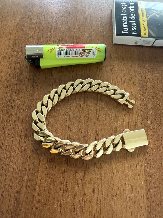 Bratara aur Cuban plina aur masiv 14 karate 100 grame lucrata manual
