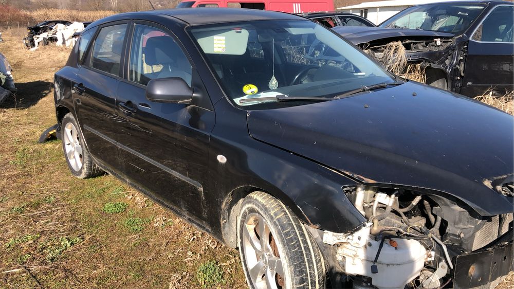 Far xenon stanga trager usa haion radiator apa ac mazda 3 2005-2008