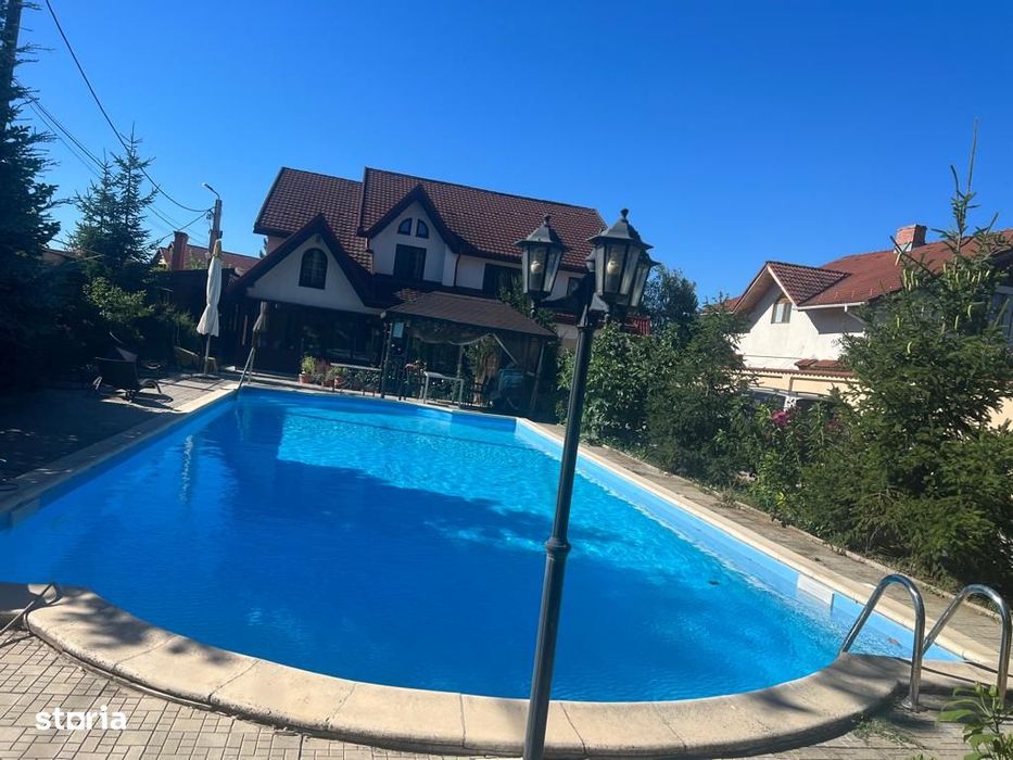 Vila cu piscina, v-v de lac, se vinde utilata si mobilata