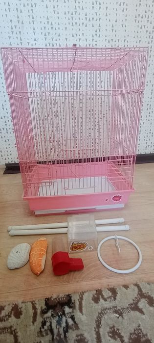 Клетка для попугая розовой цвет