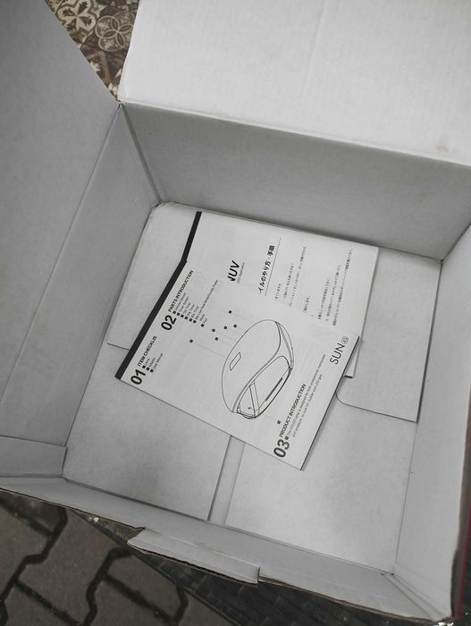Продава нова лампа за маникюр, В кутия и със зарядно и книжки към нея