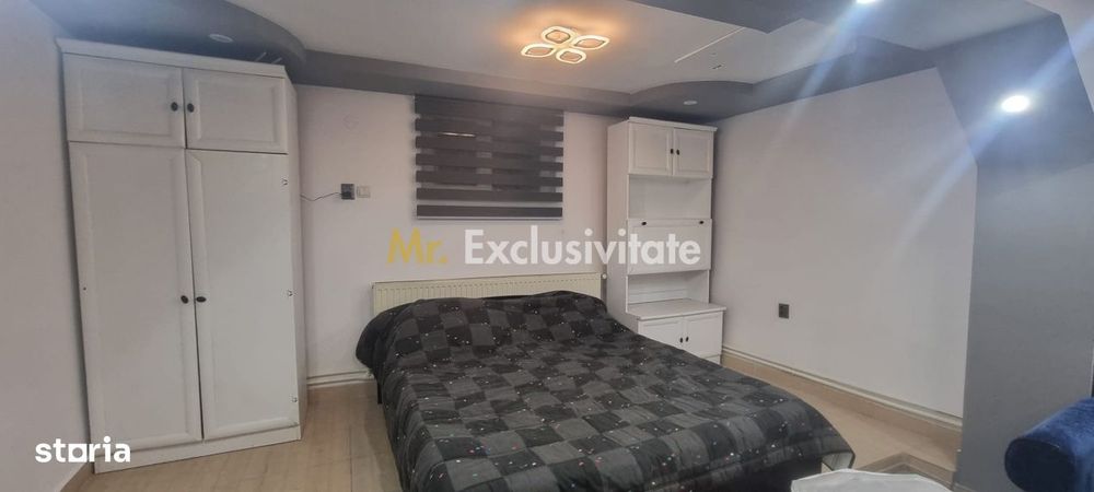 Casă P+M cu 1.558 mp teren, livadă și garaj