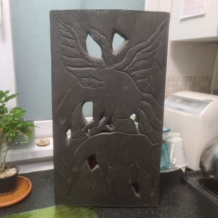 Pasarea phoenix sculptat